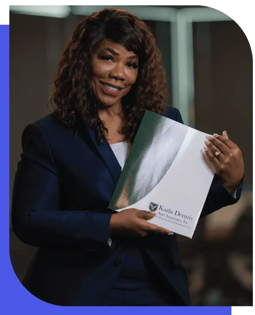 A professional portrait of Karla Dennis, smiling and holding a branded folder.